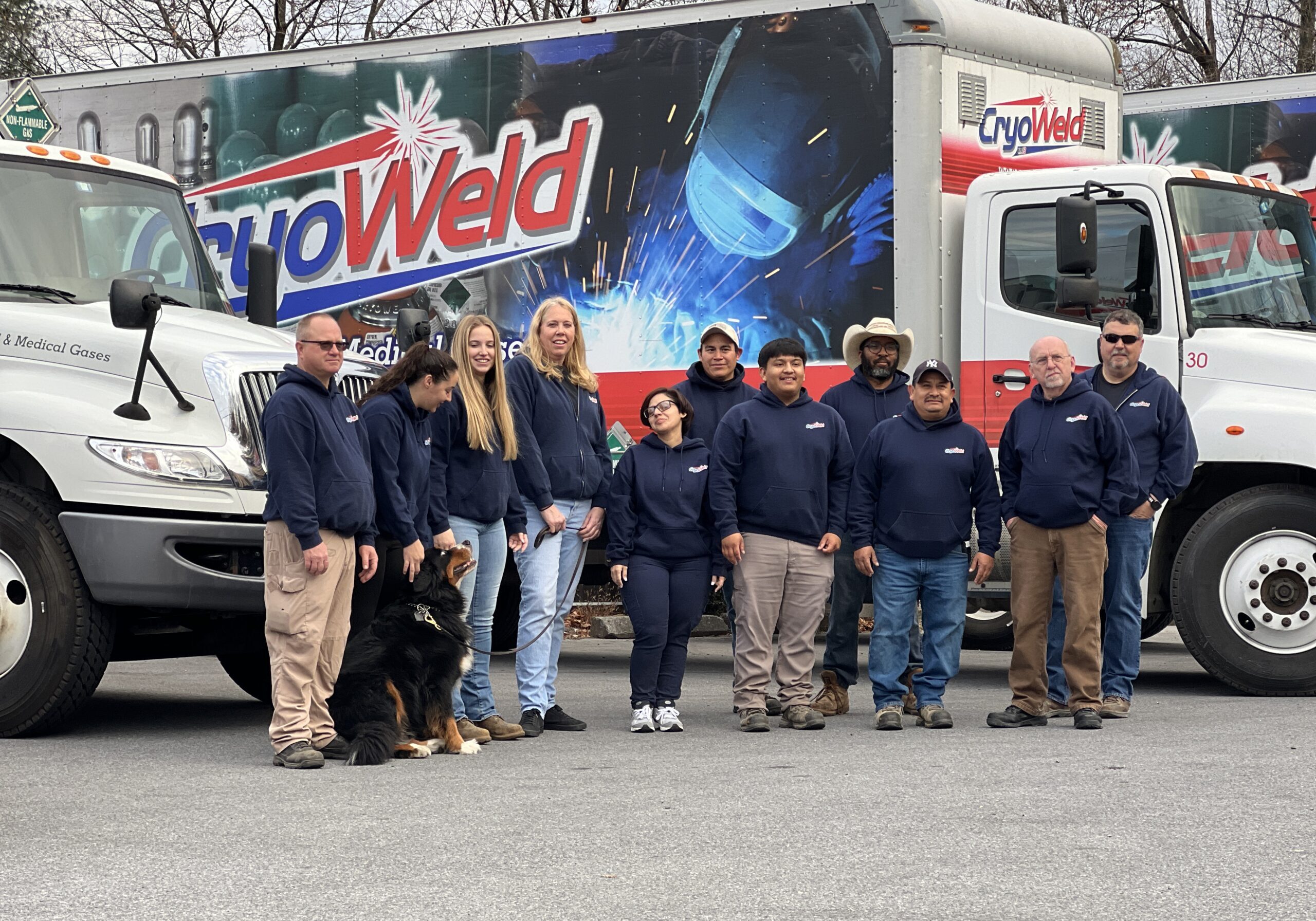 CryoWeld team standing in front of delivery fleet providing gas delivery across New York and Connecticut